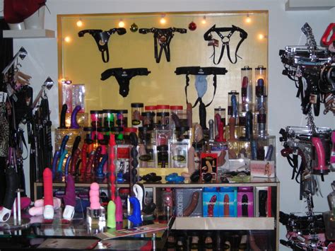the she bop wall of dildos and harnesses the redhead bedhead