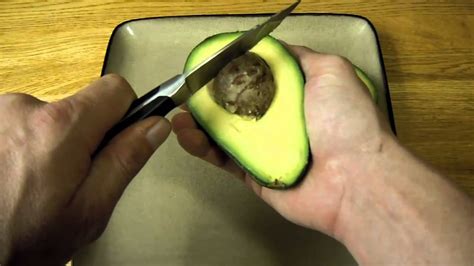 How To Cut Open An Avocado Put The Two Halves Back Together Cover
