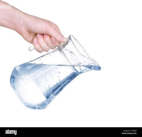Pouring Water From Glass Pitcher On White Background Stock Photo Alamy