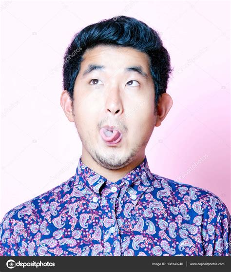 Geeky Asian Man With Funny Face — Stock Photo © Londondeposit 138140246