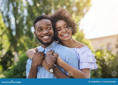 African American Couple In Love Hugging In Park Stock Photo Image Of