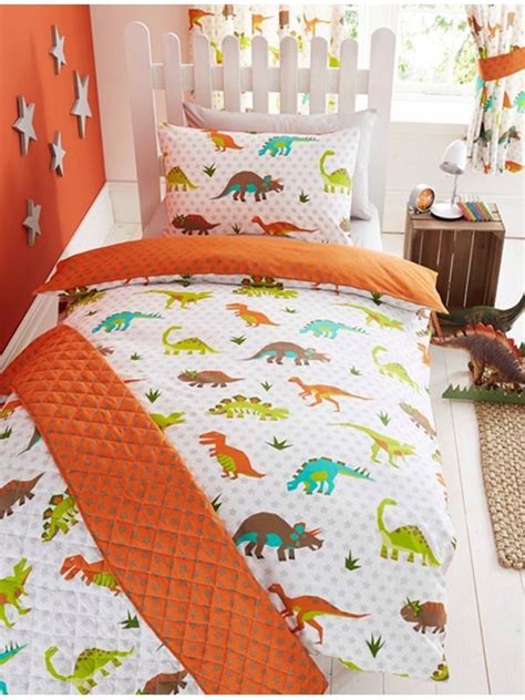Set includes a quilt, flat sheet, fitted sheet, pillow case, and a decorative throw pillow with coordinating gingham and dinosaur prints in blue. Prehistoric Dinosaur Junior Duvet Cover and Pillowcase Set ...