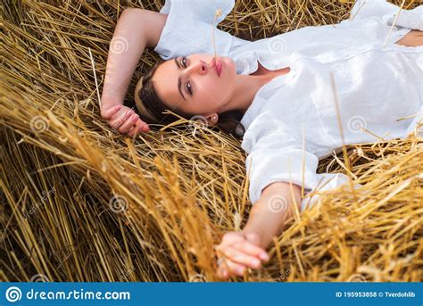 Young Farmer Woman While Laying In Hayloft Sensual Girl Lying In The