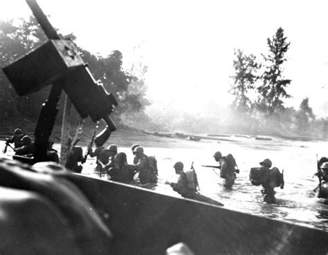 marines wading ashore on d day at bougainville as seen from a beached lcvp war of the pacific