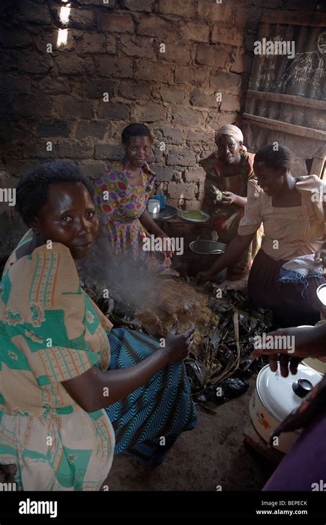 Uganda Women Making Matoke The Traditional Steamed Banana Staple