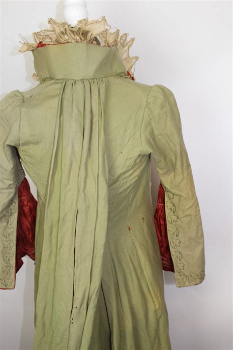 Good Shot Of The Back Watteau Pleat Hanging Sleeves And Puffed Sleeve