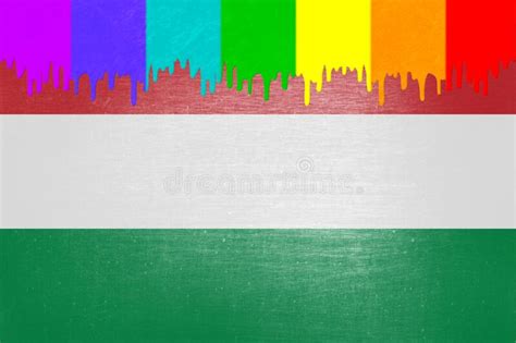 Paint Rainbow Flag Is Dripping Over The National Flag Of Hungary Stock