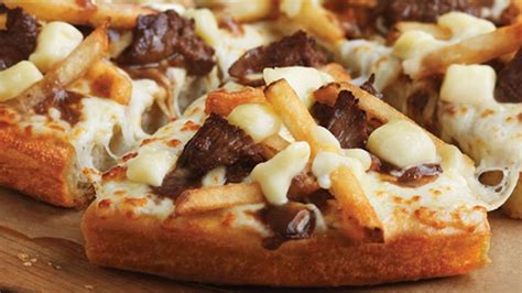 Pizza Hut Canada Unleashes The Cheesy Beef Poutine Pizza Eater
