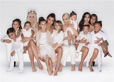 In the sweet shot, the reality star sat on a set of stairs with her youngest, 7 months, in her lap. The 2018 Kardashian Christmas Card Was Photoshopped—And So? - HelloGiggles