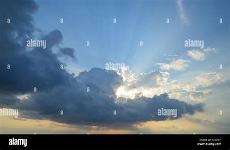Sunrays Shining Through Clouds Stock Photo Alamy