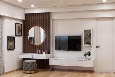 Spacious TV Unit Styled With Circular Mirror Livspace