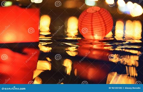 Paper Lanterns Floating In Water At Night Stock Image Image Of Candle