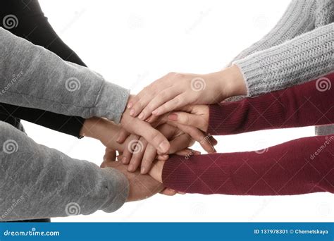 Young People Putting Their Hands Together On White Closeup Stock Image