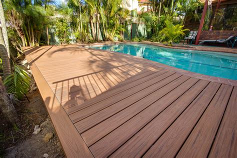 Spray decking, also known as kool deck, is a very popular choice for pool decking as it is as durable as concrete and significantly cooler to the touch. Carindale Trex Pool Deck Project | Deking Decks