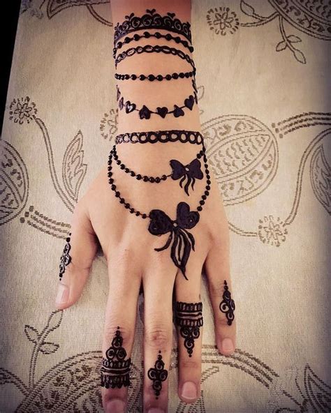 36 Beautiful Henna Tattoo Design Ideas Worldoutfits Henna Tattoo