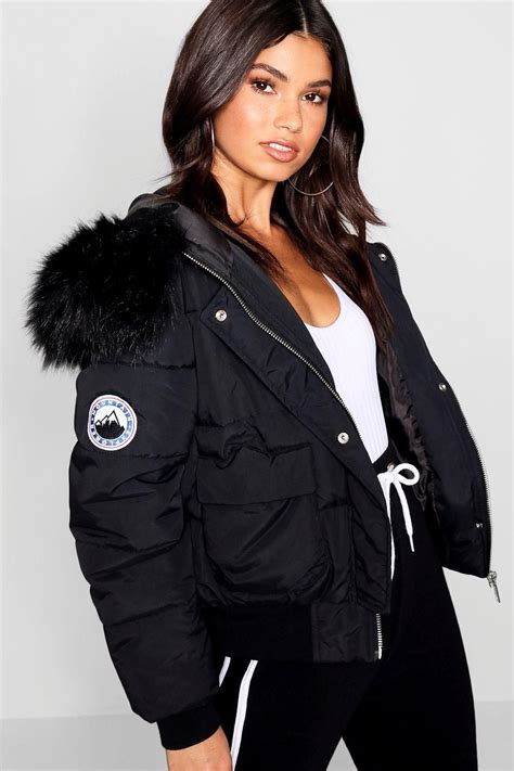 Check out our hidden hood jacket selection for the very best in unique or custom, handmade pieces from our shops. Black Faux Fur Hood Crop Puffer | boohoo in 2020 | Puffer ...