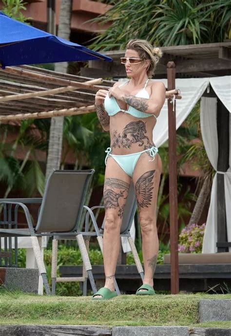 katie price unveils huge tattoos and biggest ever boobs in minuscule bikini daily star
