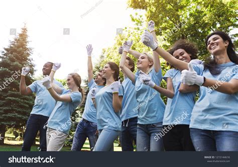Group Happy Volunteers Celebrating Success Park Stock Photo Edit Now