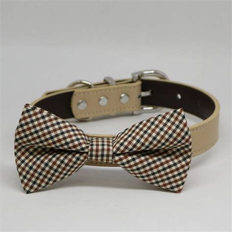 A Dog Collar With A Bow Tie Attached To Its Front And Back Side