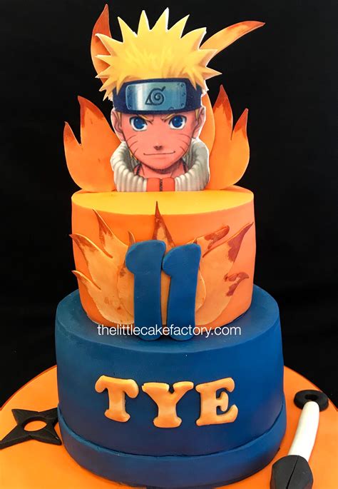 A Birthday Cake With The Character Naruto On Its Top Tier Is Blue And