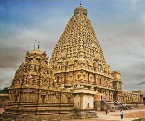 An Ornately Decorated Temple With Steps Leading Up To The Top And Side