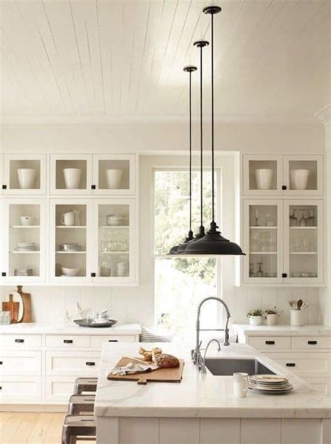 White Kitchen Mixed With Black Light Fixtures Glass Cabinets And
