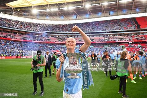 Erling Haaland Of Manchester City Celebrates With The Fa Cup Trophy