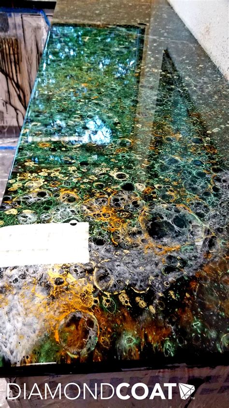 Resin can be poured onto your countertop after you have added whatever materials you would like to be visible onto the surface. The Designers Dream - How to Create Your Custom Countertop ...