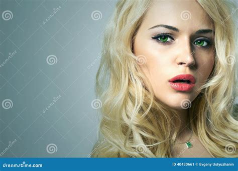 Young Womanbeautiful Blond Girl With Green Eyescurly Hair Stock Image
