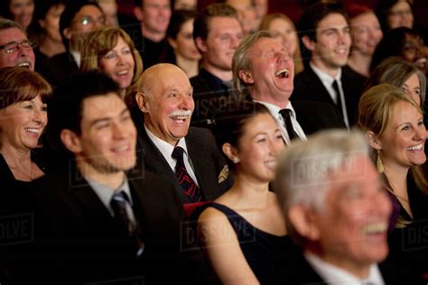 People Smiling And Laughing In Theater Audience Stock Photo Dissolve