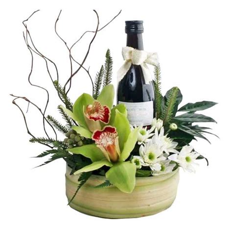 We package our plants so they travel well in transit, they will come in a special designed plant box with carry handles making it easier for yourselves should you plant gift. Wine Gifts Basket Delivery Singapore BF4130 Arrangement