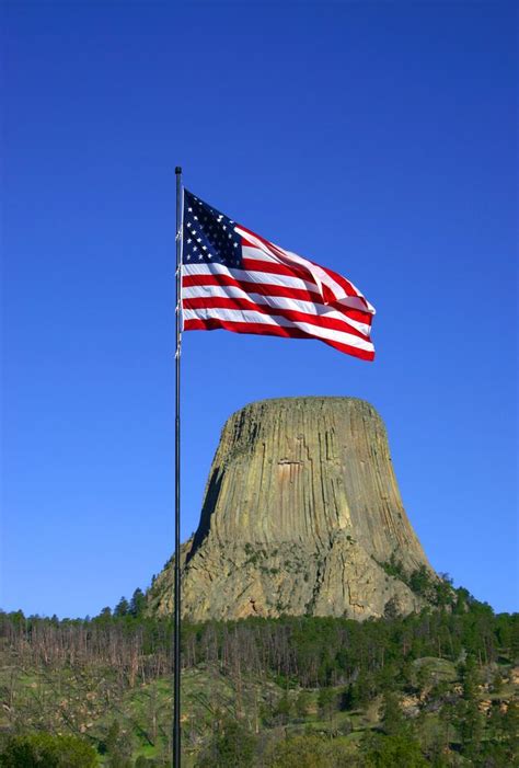 Devils Tower Is A Breathtaking Rock Formation Located Above The