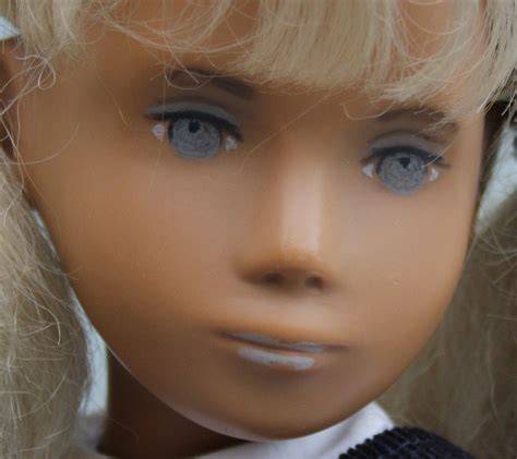 close up of 15 vinyl blonde sasha doll very earliest doll from the english production with