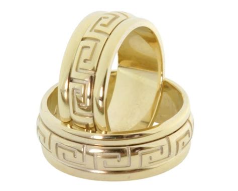 18k Gold Wedding Bands With The Greek Symbol For Eternity Wedding