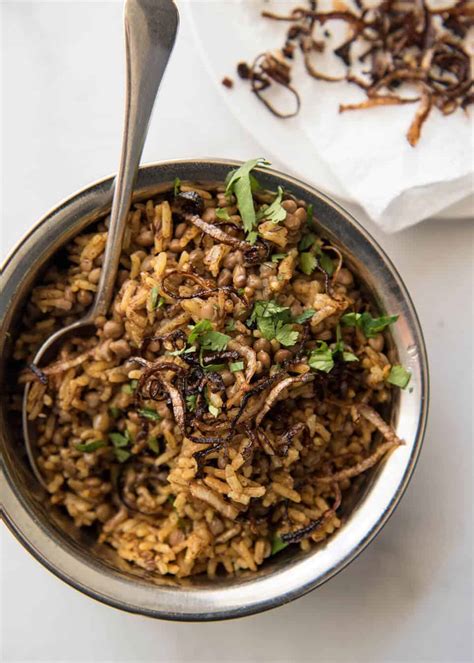 Stir in cumin, turmeric and rice; Middle Eastern Spiced Lentil and Rice (Mejadra) | RecipeTin Eats