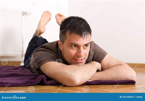 Man Lying Down On Stomach