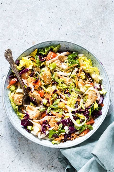 Lightly dressed chinese chicken salad with grilled chicken, crunchy wontons, toasted almonds, and sprinkled with sesame seeds over a crunchy napa cabbage and carrot salad. Love Asian Salads? Then this Chinese Chicken Salad topped with a tangy Asian Salad Dressing is ...