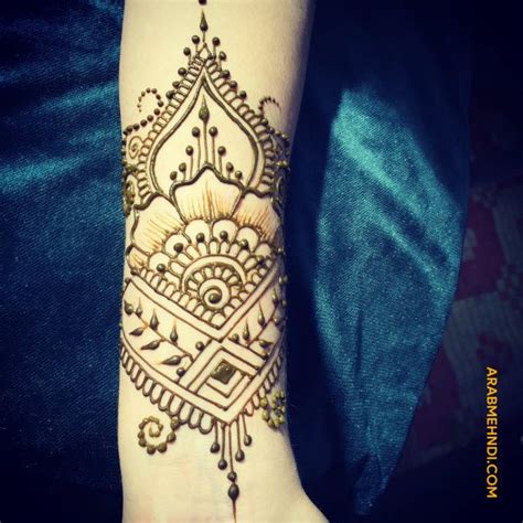 A Womans Hand With A Henna Tattoo On It