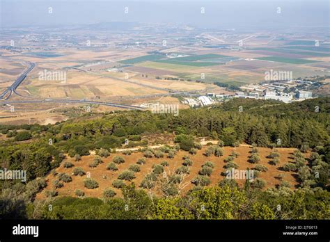 View Of The Jezreel Valley In Fog In Winter Cloudy Day From Muhraqa On