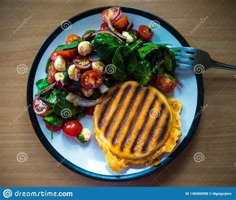 Homemade Breakfast Grilled English Miffin Sandwich Served With Side