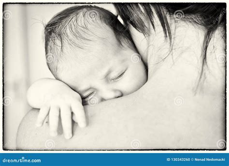 The Newborn Sleeps On His Mother S Shoulder Stock Photo Image Of