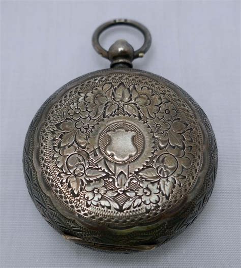 and lovely little swiss ladies pocket watch 935 silver antiques board