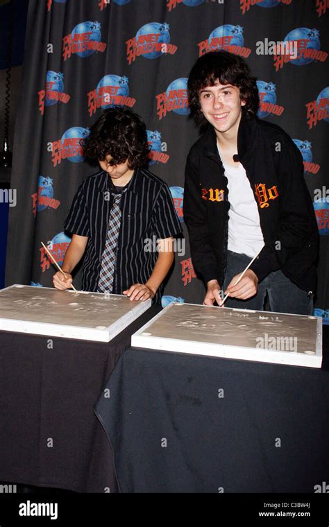 alex wolff and nat wolff of the naked brothers band hand print ceremony at planet hollywood