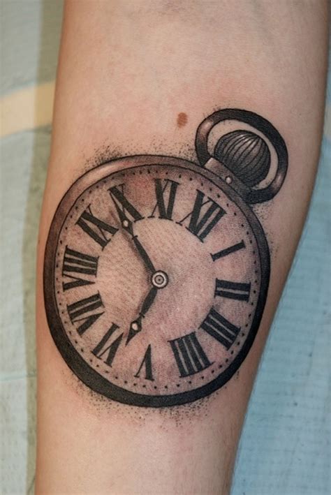 By combining a roman numeral tattoo with the arrow symbol you can cross off two major body art trends in one fell swoop. Broken Roman Numeral Clock Tattoo - Tattoos Gallery