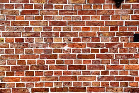 Download Rusty Brown Brick Wall Wallpaper