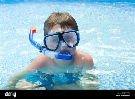 Boy Swimming In Snorkel In Pool Stock Photo Alamy