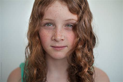 Portrait Of A Preteen Girl With Red Hair And Freckles By Skye Torossian