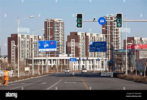 Cars Travel On A Nearly Empty Road In Kangbashi District Ordos City