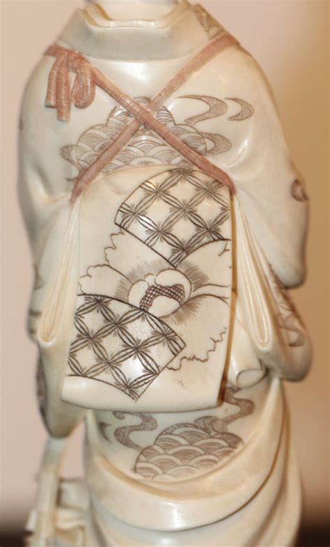 Japanese Carved Ivory Figure Of A Geisha