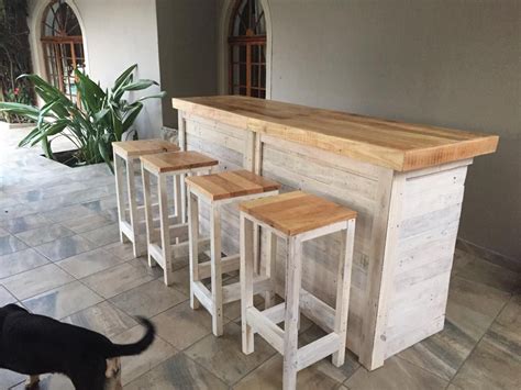 Bar counter installed in the living room or onkitchen, practical and very convenient for drinking drinks or quick snacks. Bar Counter with Stools from Pallet Wood | Diy bar stools, Pallet bar stools, Diy outdoor bar